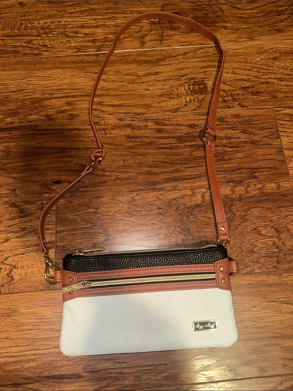 Itzy Ritzy Tricolor Crossbody Bag in White, Black & Tan